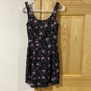 brand: Divided. short black dress with floral patterns. Size 2